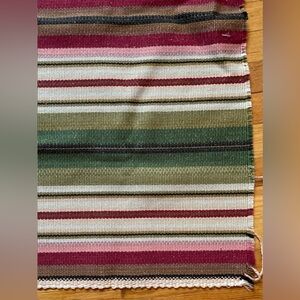 Hand made rug from South America. Hand woven stripes